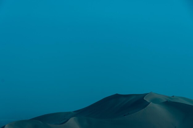 Low angle view of tent against clear blue sky