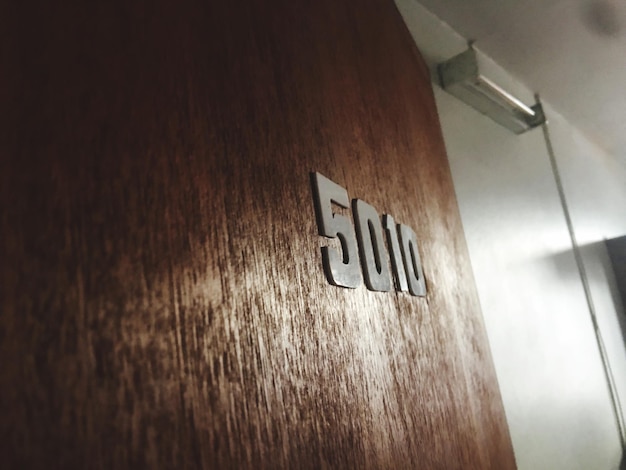 Low angle view of text on wall