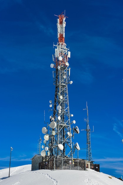 Low angle view of tower against blue sky