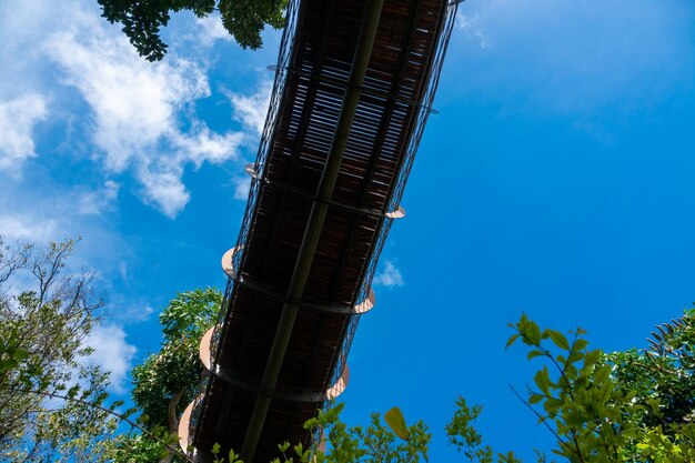 Low angle view of tower against blue sky