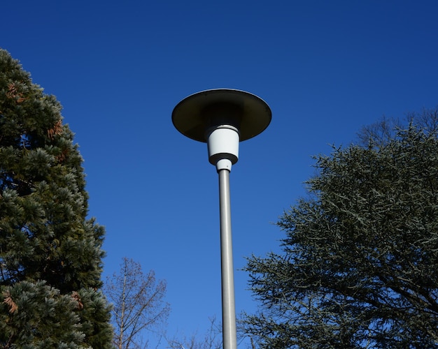 Low angle view of tower against blue sky