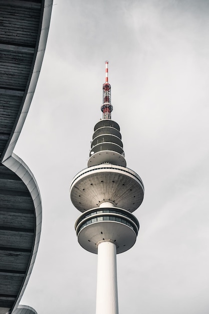 Low angle view of tower against sky in city