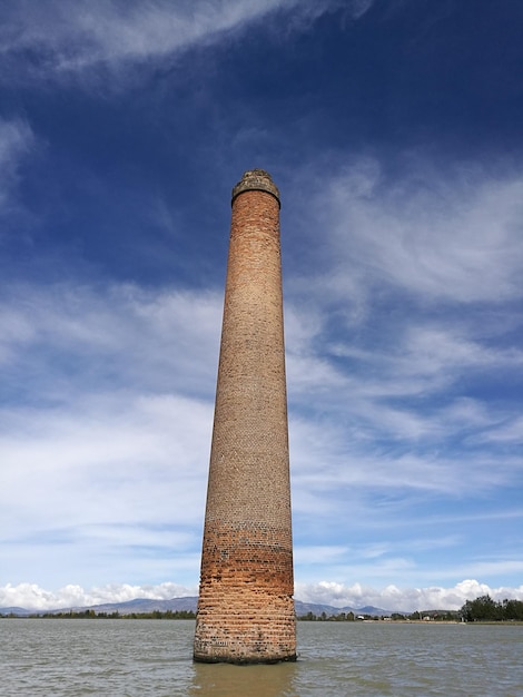 Low angle view of tower against sky