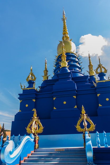 Low angle view of traditional building against blue sky