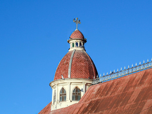 Low angle view of traditional building against clear blue sky