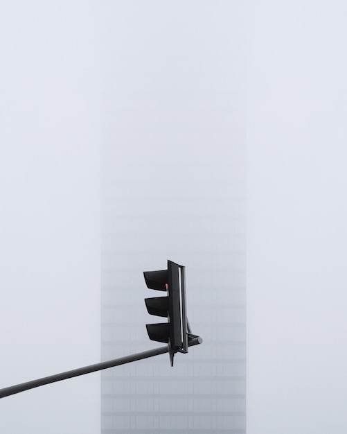 Low angle view of traffic signal against building