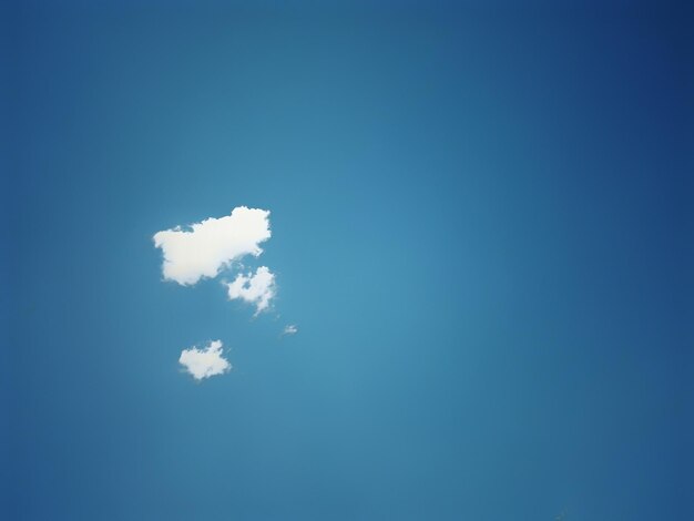 Low angle view of tree against blue sky