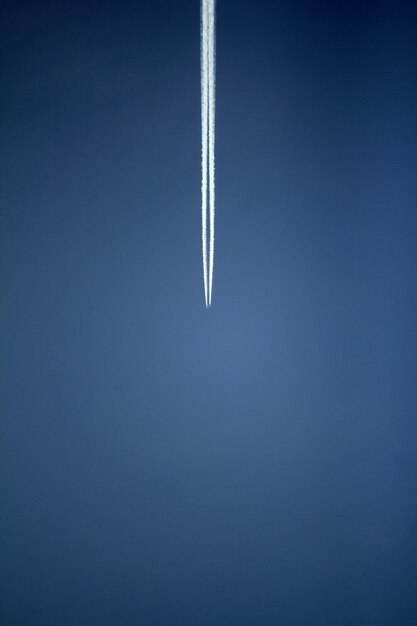 Low angle view of vapor trail in clear sky