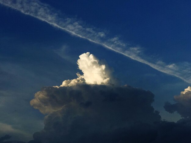 low angle view of vapor trail in sky