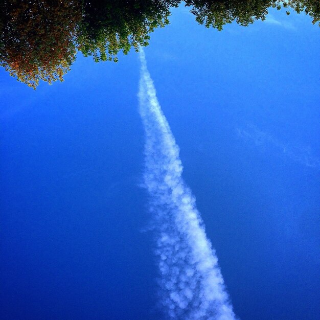 Low angle view of vapor trail in sky