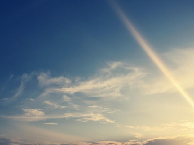 Low angle view of vapor trails in sky