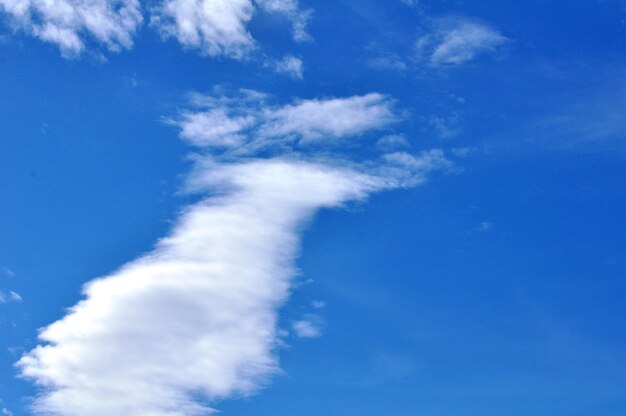 Low angle view of white clouds in blue sky