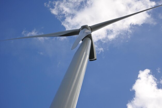 Low angle view of wind turbine against sky