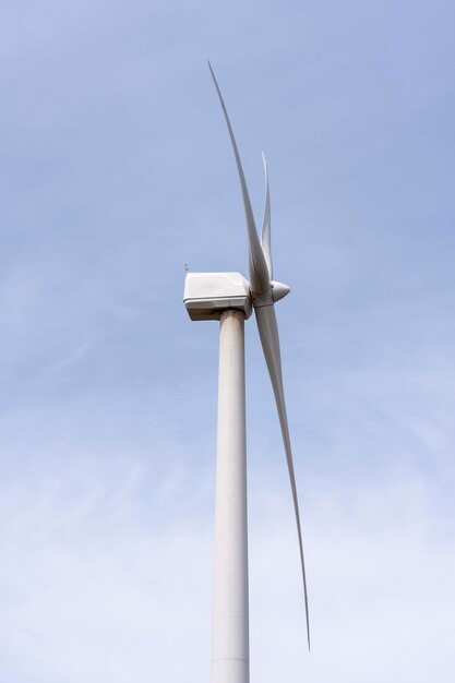 Low angle view of wind turbine against sky