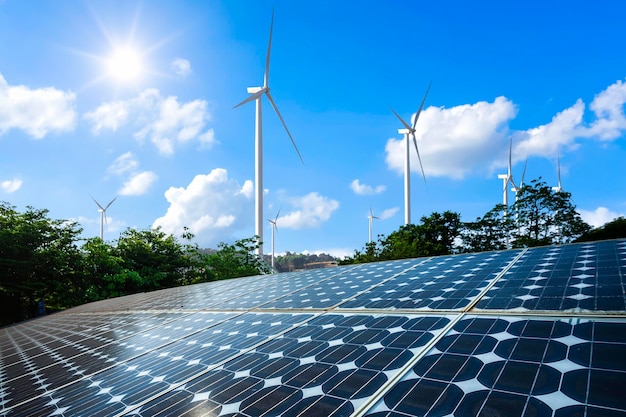 Photo low angle view of wind turbines against sky