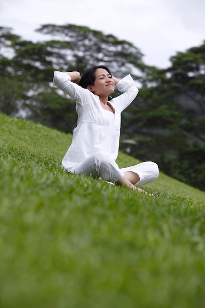 Low angle view of woman on field