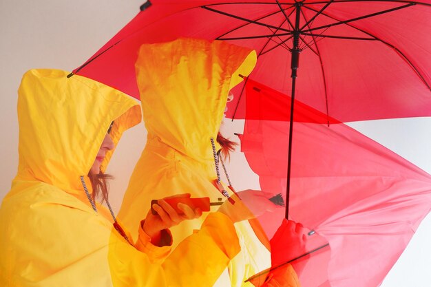 Low angle view of woman holding umbrella