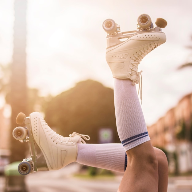 Low angle view of woman's leg wearing vintage roller skates