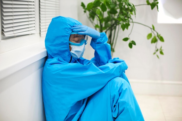 Low angle view of woman wearing mask