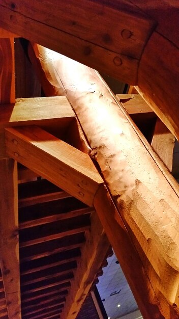 low angle view of wooden pole of log cabin