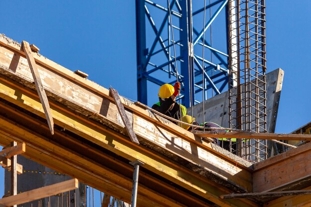 low angle view of worker working at construction site