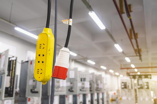 Low angle view of yellow lights hanging from ceiling