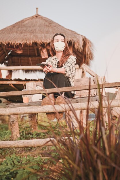 Low angle view of young woman relax in countryside area