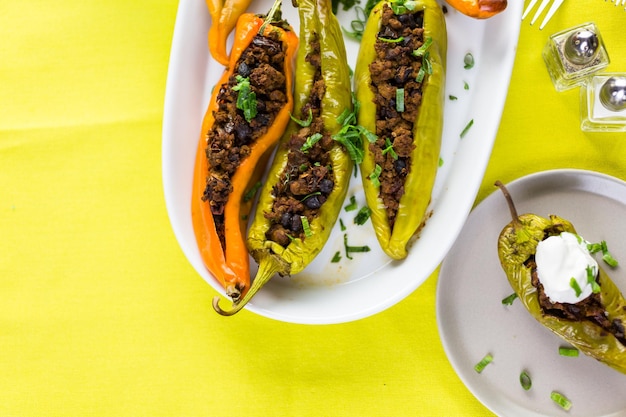 Photo low calorie chipotle beef & bean stuffed chili peppers.