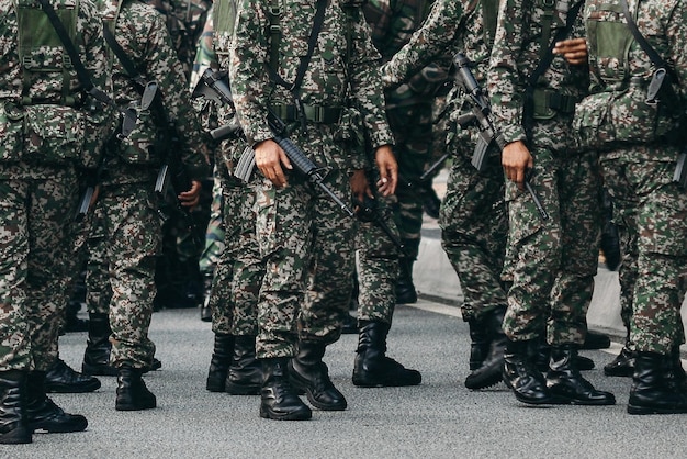 low section of army soldiers on road