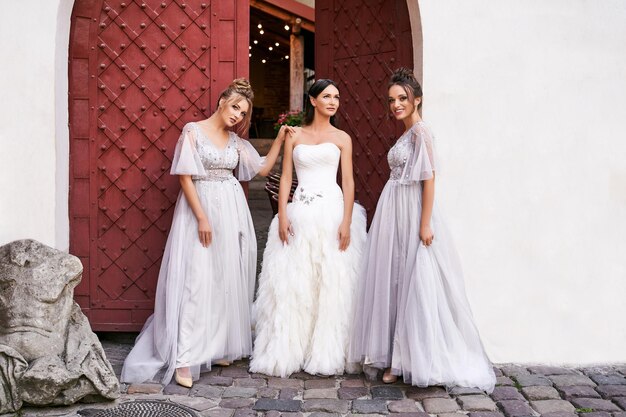 Photo low section of bride standing against wall