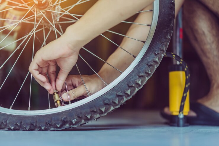 Step 5: Pry off one side of the tyre