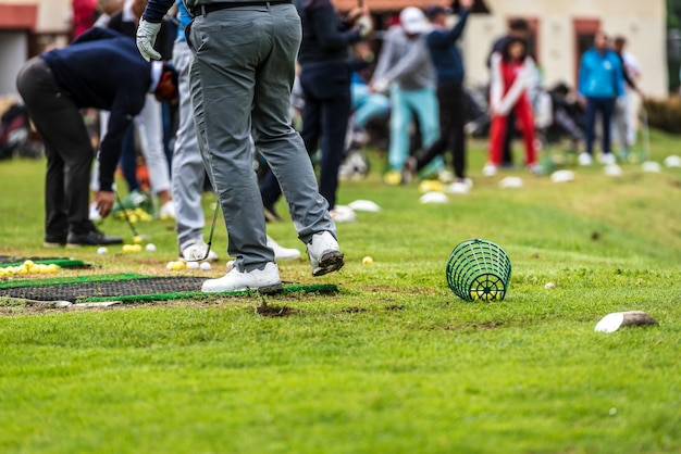 Low section of man playing golf course