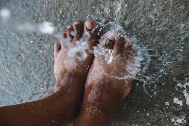 Photo low section of man in water