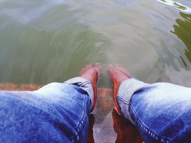 Low section of people in lake