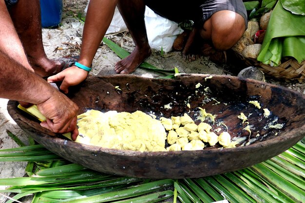 Photo low section of people preparing food in kitchen utensil