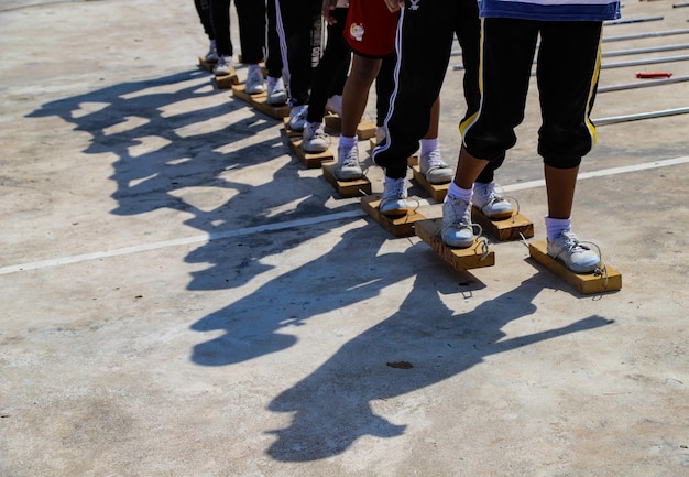 Low section of people walking on street