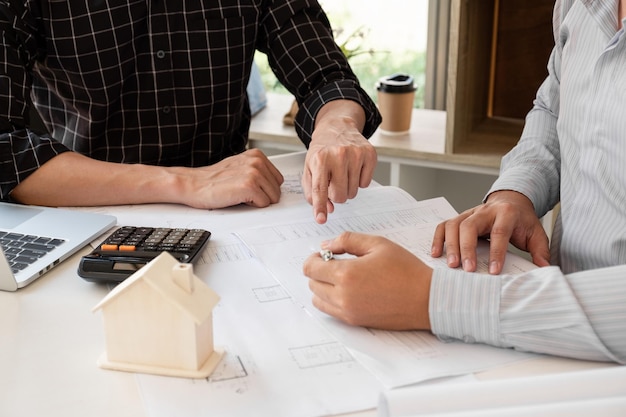 Photo low section of people working on table