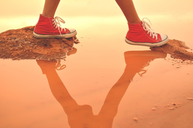 Photo low section of person in puddle