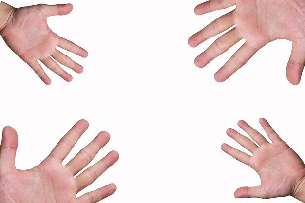 Photo low section of person touching hands over white background