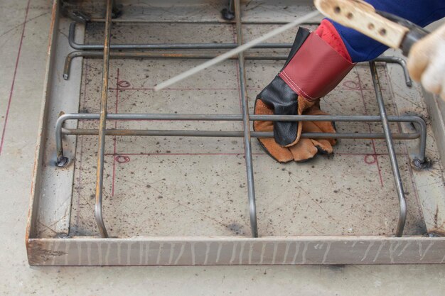 Photo low section of shoes at construction site