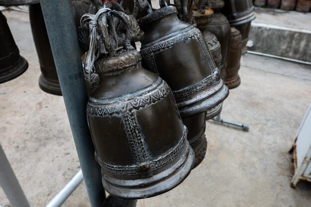 Low section of shoes standing on metal