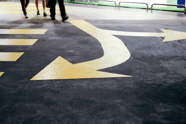 low section view of arrow symbol on road