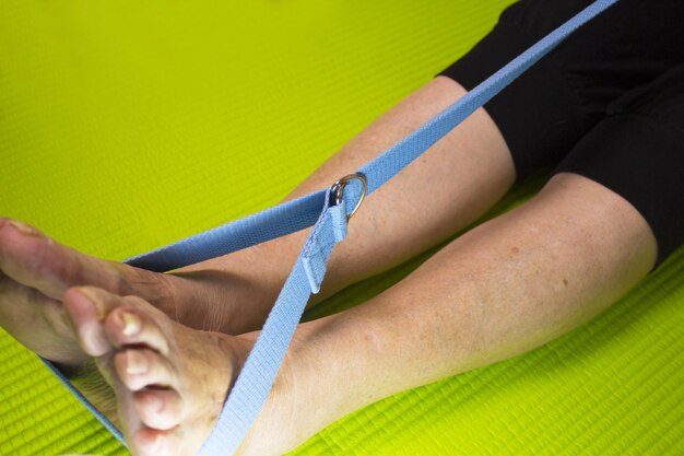 Low section of woman exercising in gym