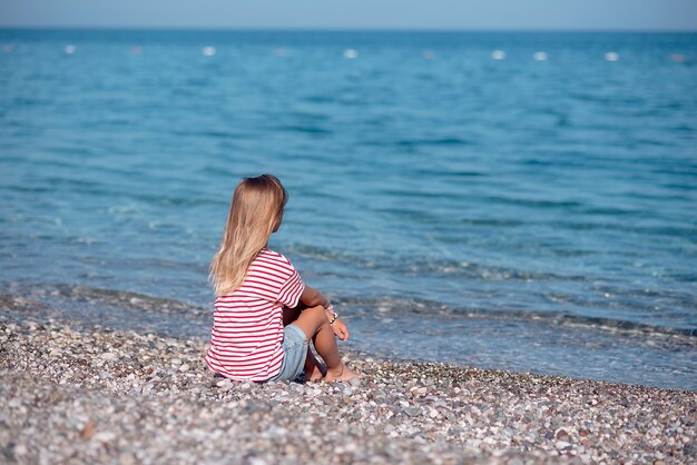 Low section of woman in sea