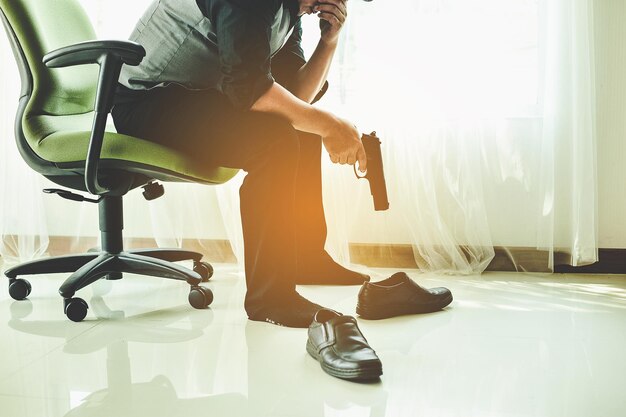 Photo low section of woman sitting on chair at home