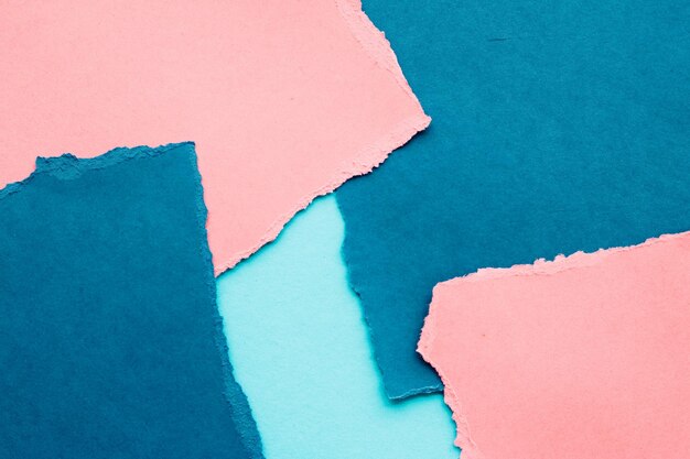 Low section of woman standing against blue background