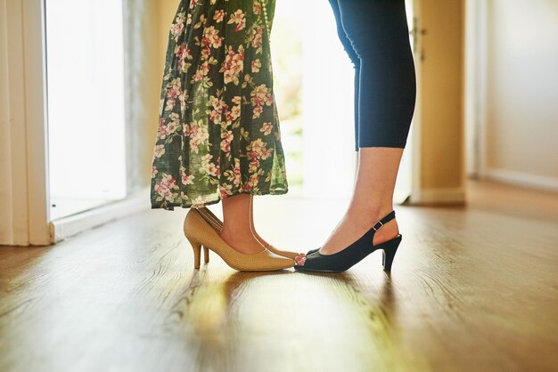 Low section of woman standing on floor