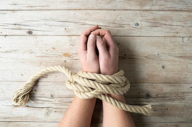 Low section of woman with rope