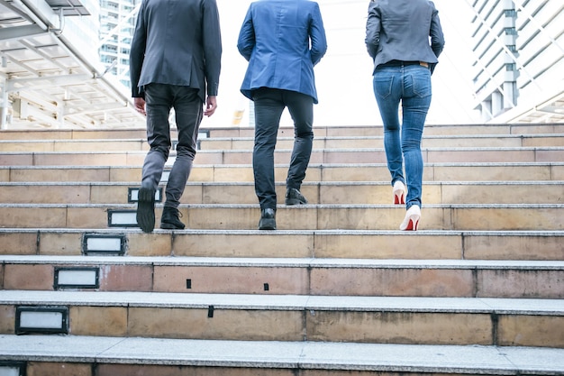 Photo low section of women walking on staircase