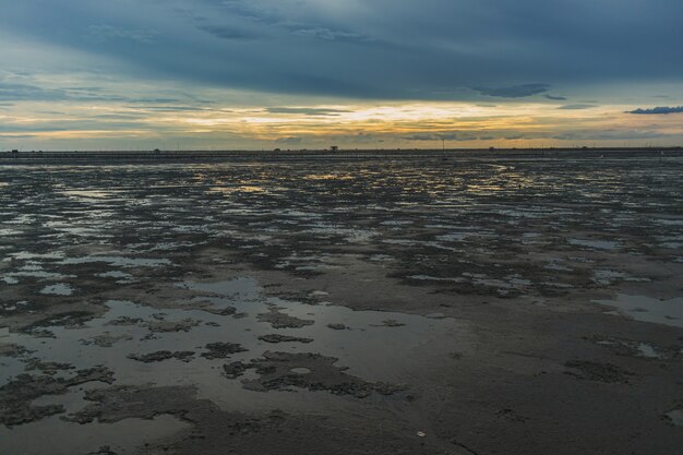 Low tide showing area of mud sea in the evening